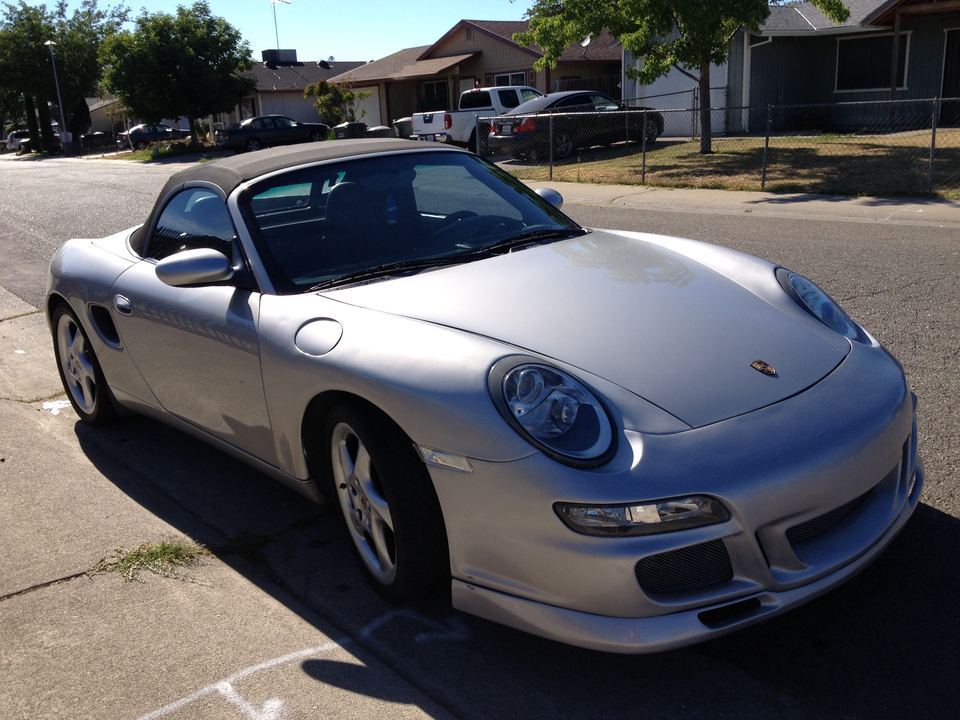 Silver Porsche Boxster after a 911 front-end swap and paint