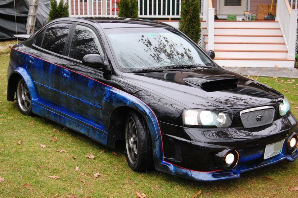 Hyundai Elantra with custom blue and black marbled paint and body kit