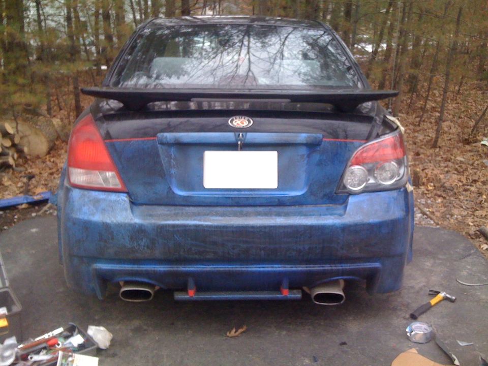 Rear of a Hyundai Elantra with a swapped rear end and spoiler