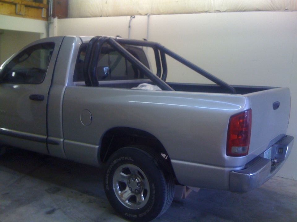 Silver Dodge Ram pickup after paint
