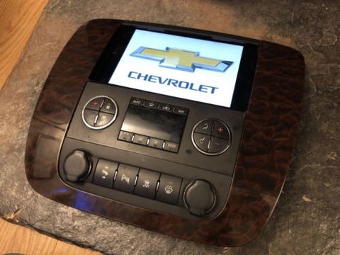 Chevrolet Suburban wood-grain dash bezel with an integrated iPad