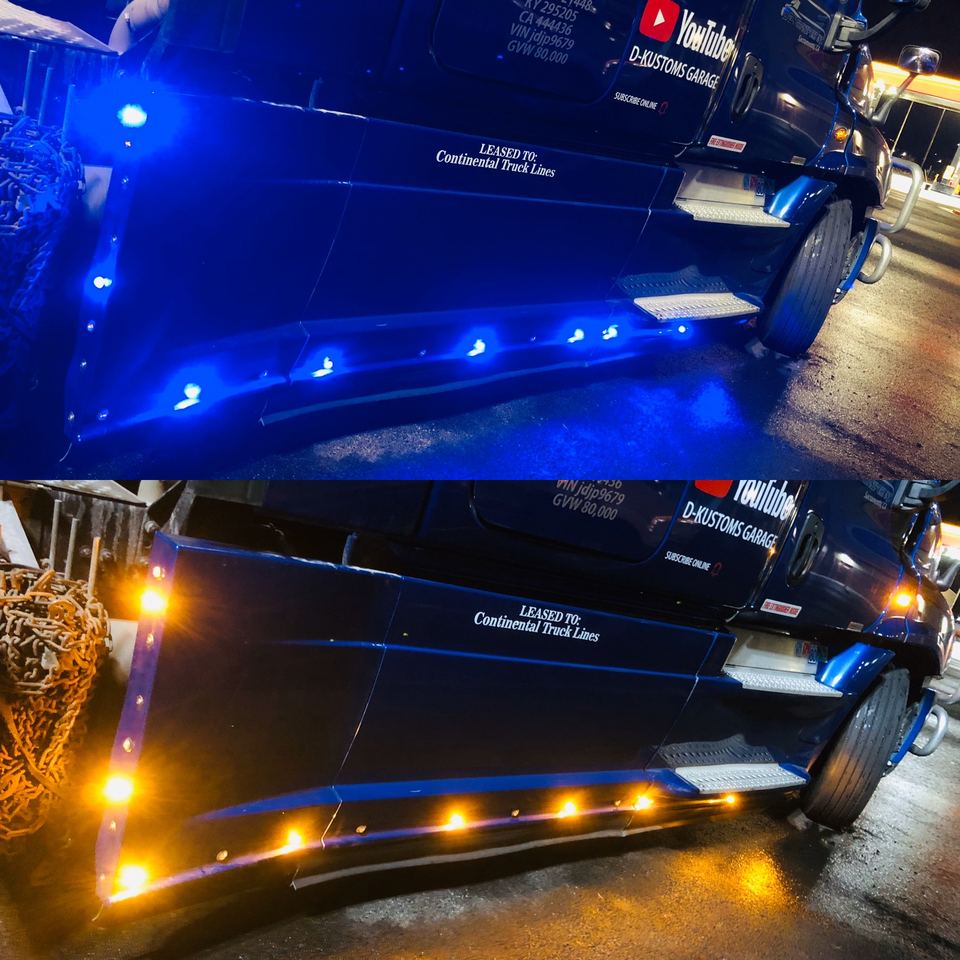 Semi-truck side skirt LEDs shown in blue and in amber